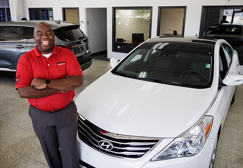 General sales manager Gavin Stewart poses for a portrait on the showroom floor at the new Mountain View Hyundai on Wednesday, July 25, 2018, in Ringgold, Ga. 
