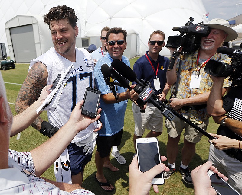 Wednesday's NFL: Taylor Lewan reports to Tennessee Titans with no deal