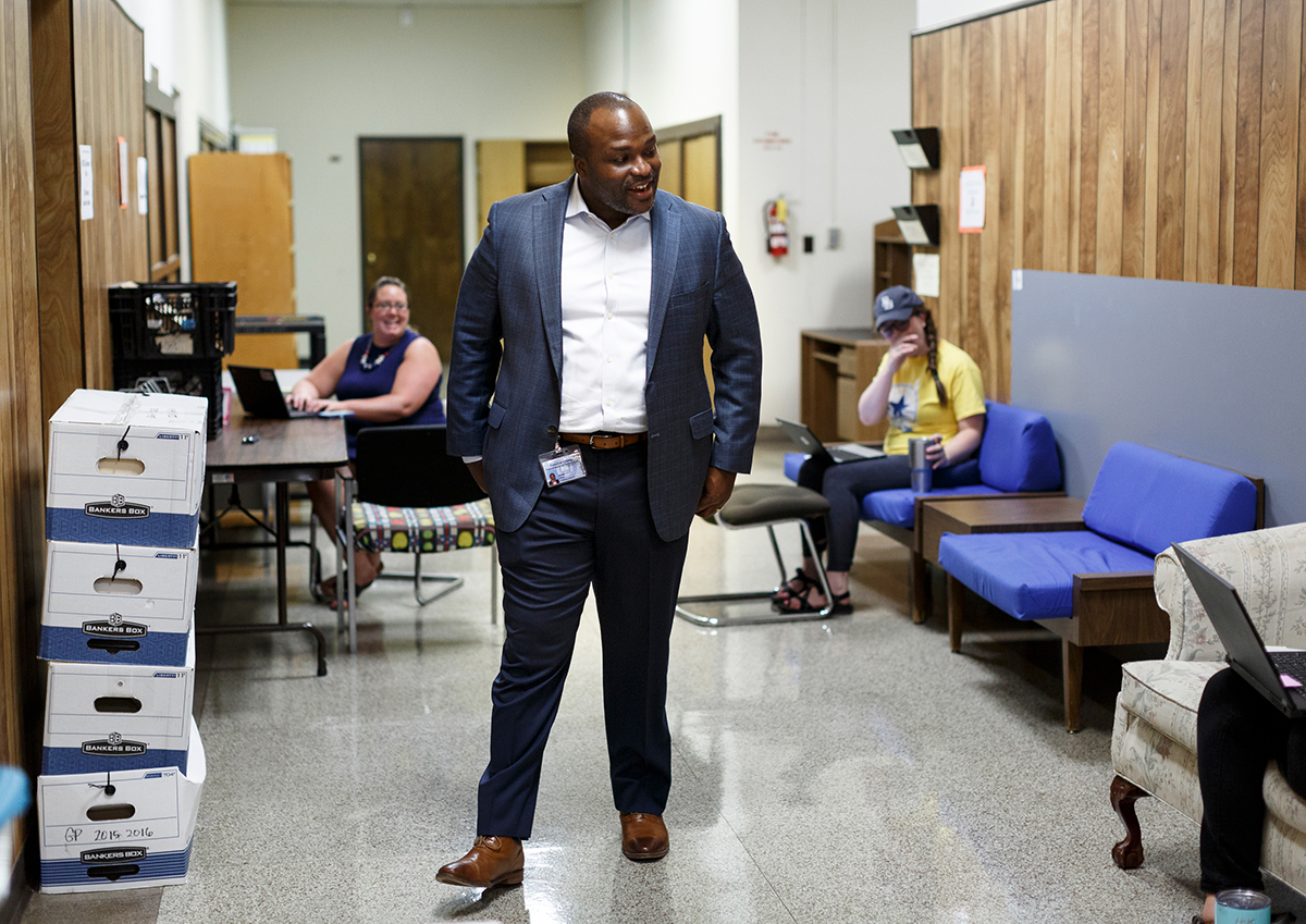 Hamilton County Schools Superintendent Bryan Johnson talks with new coaches in the hallways of the Hamilton County School building on W. 40th Street on Thursday, July 12, 2018, in Chattanooga, Tenn. Johnson is wrapping up his first year as superintendent.
