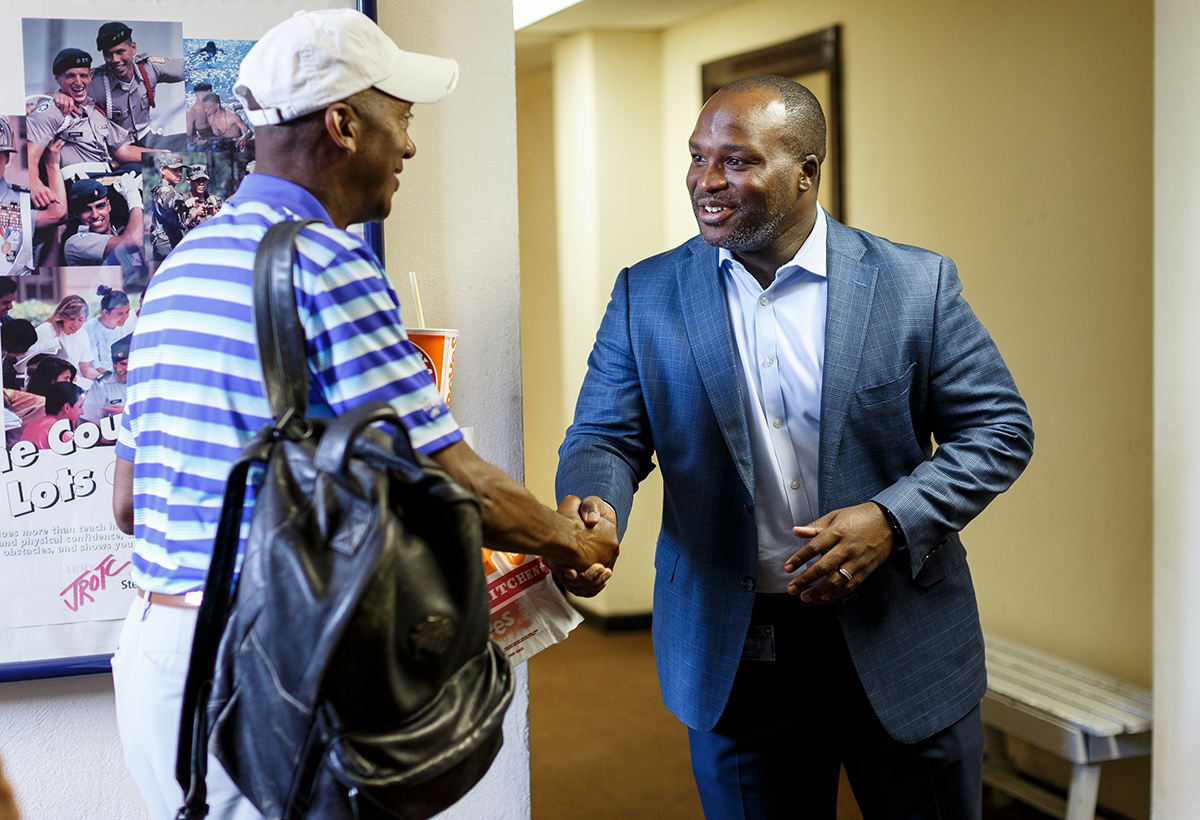 Hamilton County Schools Superintendent Bryan Johnson shakes hands with incoming JROTC director Lt. Col. William Brooks at the Hamilton County School building on W. 40th Street on Thursday, July 12, 2018, in Chattanooga, Tenn. Johnson is wrapping up his first year as superintendent.