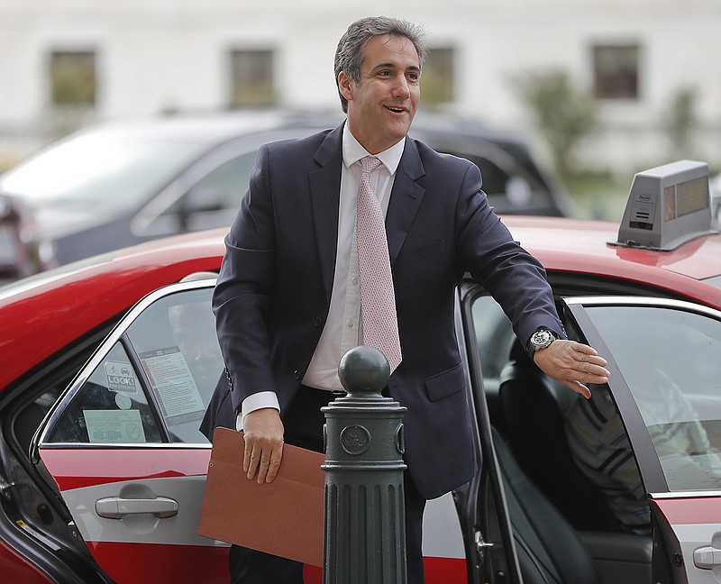 In this Sept. 19, 2017, file photo, Michael Cohen arrives on Capitol Hill in Washington. A secret recording between Donald Trump and Cohen discussing payments to a Playboy model has brought renewed attention to the question of whether the candidate and his lawyer sought to stymie politically damaging stories from women ahead of the 2016 presidential election. But it's not clear that the brief recording, on its own, creates additional legal problems for either man. (AP Photo/Pablo Martinez Monsivais, File)