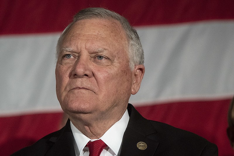 In this July 26, 2018 file photo, Georgia Governor Nathan Deal attends a state Republican Party unity rally, in Peachtree Corners, Ga. Georgia's governor has made good on his vow to restore a jet fuel tax cut that had been controversially killed by state GOP lawmakers irate over Delta Air Lines' decision to cut ties with the National Rifle Association. In a statement Monday, July 30, 2018, Deal ordered the collection of the state's 4 percent sales tax on jet fuel to be suspended. (AP Photo/John Amis, File)