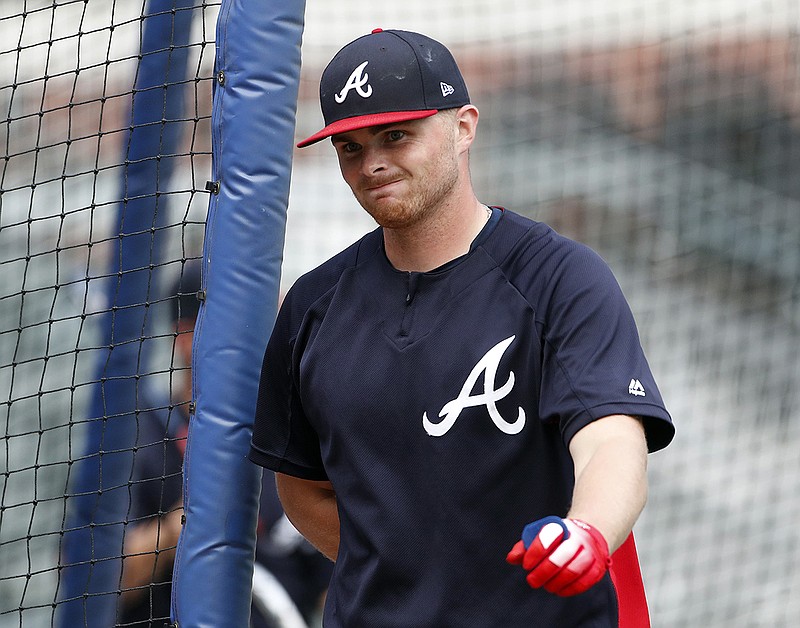 Atlanta Braves starting pitcher Sean Newcomb (15) is shown during batting practice before of a baseball game against the Miami Marlins Monday, July 30, 2018 in Atlanta. Newcomb apologized Sunday for racist, homophobic and sexist tweets he sent as a teenager, calling them "some stupid stuff." "I definitely regret it, for sure," he said. (AP Photo/John Bazemore)