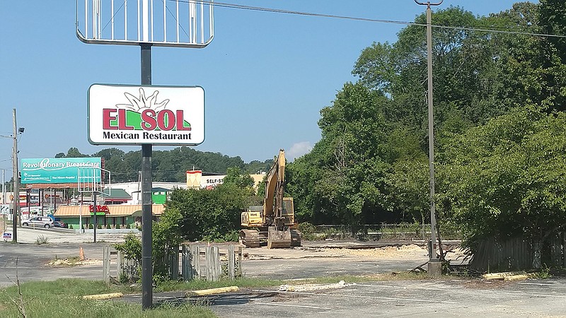 Staff photo by Mike Pare / Heavy equipment sits on the site of a planned Weigel's convenience store at Hixson Pike and North Access Road.