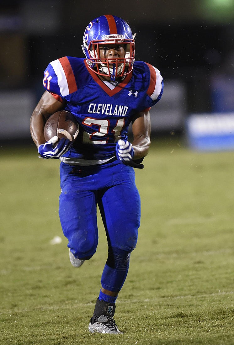 Cleveland's Keegan Jones gets outside for a big gain during a home game against East Hamilton last year.