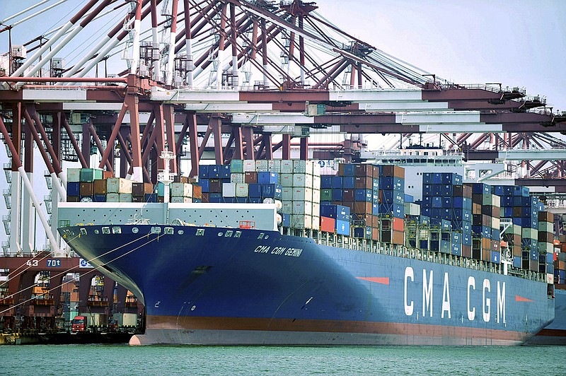 In this July 6, 2018, file photo, a container ship is docked at a port in Qingdao, in eastern China's Shandong Province. The Trump administration is proposing raising planned taxes on $200 billion in Chinese imports to 25 percent from 10 percent, turning up the pressure on Beijing in a trade war between the world's two biggest economies. (Chinatopix via AP, File)