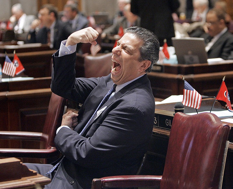 Jon Bauman, also knows as "Bowzer" from the doo-wap group Sha Na Na, strikes his stage pose during a House session in Nashville in 2007. Bauman has been lobbying states on behalf of the Vocal Group Hall of Fame for laws to prevent musical acts from passing themselves off as something they're not.  (AP Photo/Mark Humphrey)