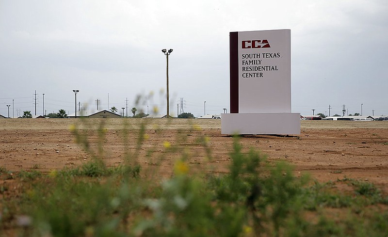 FILE - This June 30, 2015 file photo shows a sign at the entrance to the South Texas Family Residential Center in Dilley, Texas.