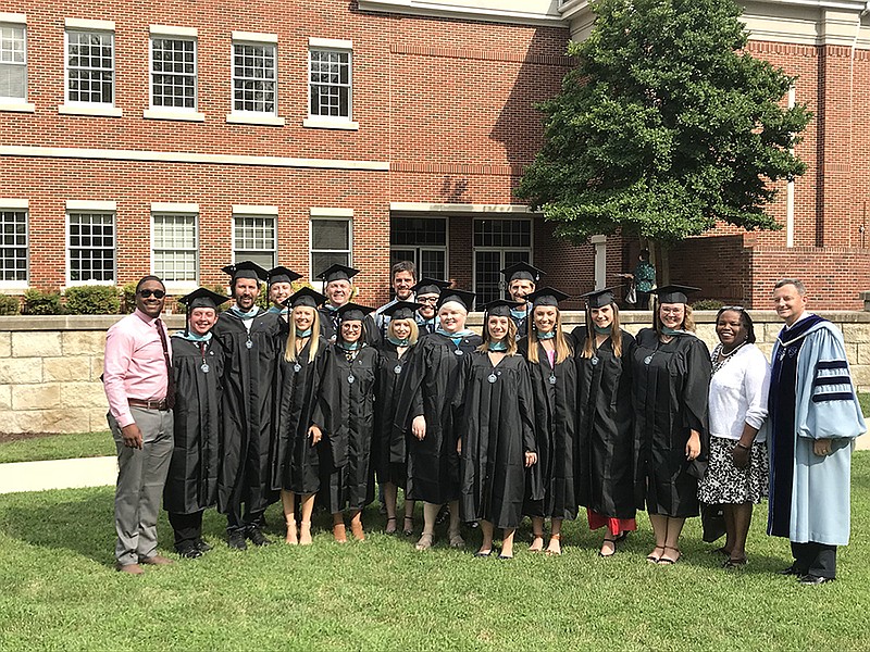 Twenty Project Inspire residents graduated from Lee University in July, part of the teacher residency program's seventh cohort. The residents, who have spent a year co-teaching with a partner teacher in Hamilton County classrooms, have been hired to teach in the county for another three years. 13 of the graduates will teach in Opportunity Zone schools next year. Contributed Photo/ Special to the Times Free Press