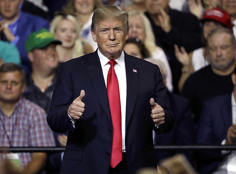 President Donald Trump gestures during a rally Tuesday in Tampa, Fla. (AP Photo/Chris O'Meara)