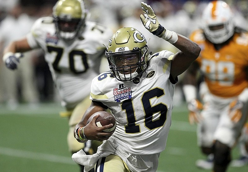 Georgia Tech quarterback TaQuon Marshall scrambles during the 2017 season opener against Tennessee in the Chick-fil-A Kickoff Game at Mercedes-Benz Stadium in Atlanta. Tennessee won 42-41 in double overtime.