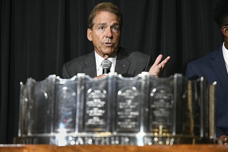 NCAA college football head coach Nick Saban of Alabama speaks during the ceremony for the acceptance of the MacArthur Bowl trophy during the Southeastern Conference Media Days at the College Football Hall of Fame in Atlanta, Wednesday, July 18, 2018. (AP Photo/John Amis)