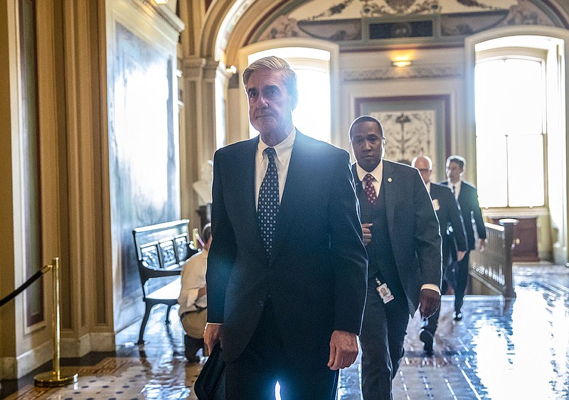 In this photo from Wednesday, June 21, 2017, Special Counsel Robert Mueller departs after a closed-door meeting with members of the Senate Judiciary Committee about Russian meddling in the election and possible connection to the Trump campaign, at the Capitol in Washington. (AP Photo/J. Scott Applewhite, file)