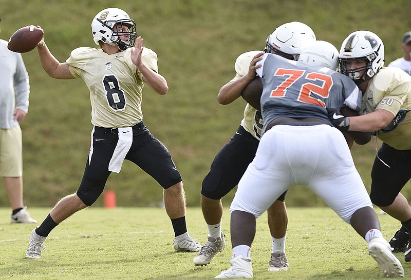 Bradley quarterback, Dylan Standifer (8), passes from behind protection.   Bradley Central High School hosted a six team high school football scrimmage with East Ridge, McMinn Central, Soddy-Daisy, Hardin Valley and Knoxville Catholic on July 28, 2018.