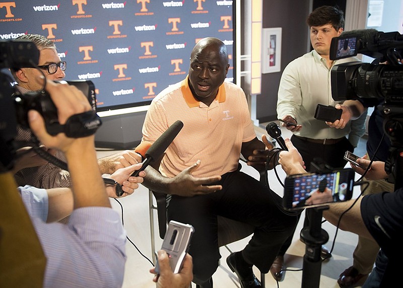 Tennessee co-defensive coordinator Chris Rumph answers questions during the Volunteers' media day Thursday in Knoxville.
