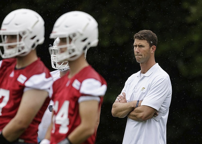 UTC football coach Tom Arth watches during the Mocs' first day of practice Wednesday at Scrappy Moore Field.