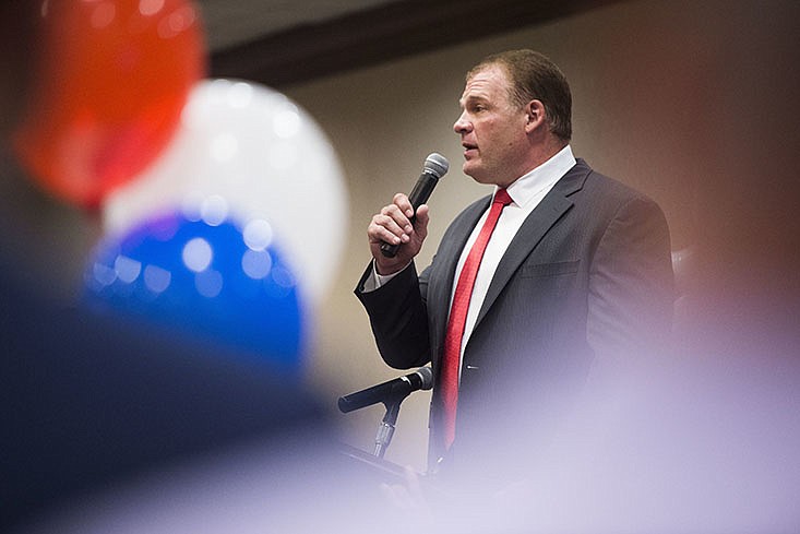 Republican Glenn Jacobs speaks to a crowd after early results showed him winning the mayoral race, Thursday, Aug. 2, 2018, in Knoxville, Tenn. 