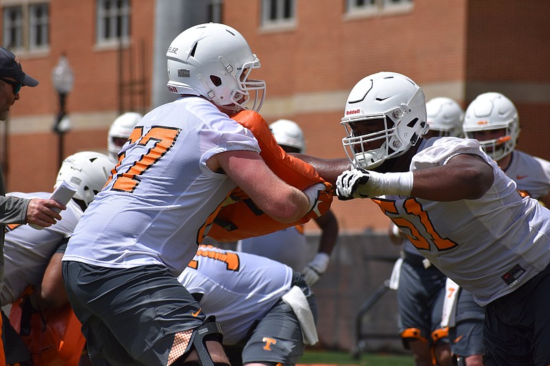 Tennessee redshirt junior offensive lineman Drew Richmond (51) works through a drill on Friday, August 3 during Tennessee's first preseason practice.