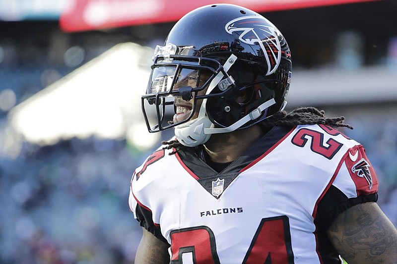 Devonta Freeman, shown during warmups for the Atlanta Falcons' playoff game against the Eagles in Philadelphia in January, is excited to be healthy in training camp.