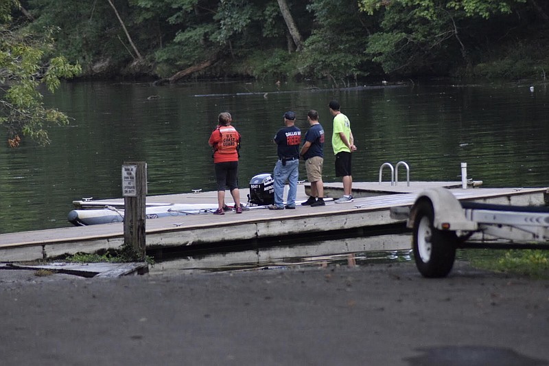 Emergency personnel respond to a potential drowning on Chickamauga Lake Saturday, Aug. 4. A man slipped while trying to cross from one boat to another and did not resurface. 