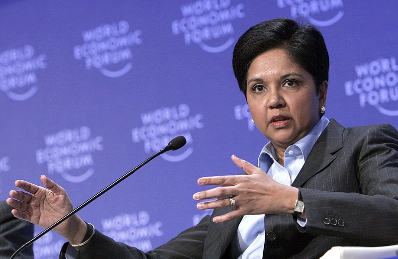 FILE- In this Jan. 29, 2009, file photo, Chairman and CEO, PepsiCo Indra Nooyi speaks during a session at the World Economic Forum in Davos, Switzerland. With Nooyi exiting PepsiCo as its longtime chief executive, the circle of CEOs in the S&P 500 is losing one of its highest profile women. Nooyi has been with PepsiCo Inc. for 24 years and held the top job for 12. (AP Photo/Virginia Mayo, File)