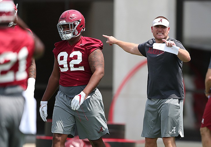 
Alabama first-year defensive coordinator Tosh Lupoi gives instructions during a recent preseason practice in Tuscaloosa. / Kent Gidley/Alabama photo
