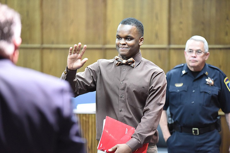 Cortez Sims walks into Judge Barry Steelman's courtroom at the start of his trial on April 4, 2017.