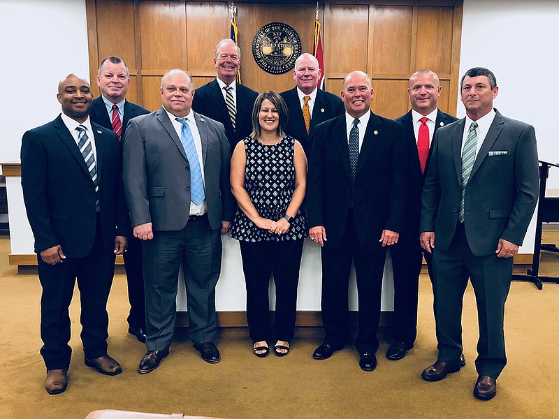 Bradley County Sheriff-elect Steve Lawson introduces his command staff. Pictured, from left, are Gabe Thomas, Lewis Jones, Bill Dyer, Steve Lawson, Cassandra Stone, Brian Smith, Jon Collins, John Stone and Alan Walsh.