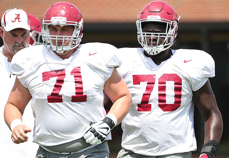 Alabama senior center Ross Pierschbacher (71), shown here during Tuesday afternoon's practice along with sophomore tackle Alex Leatherwood (70), said there is more to this year's Crimson Tide team than just quarterbacks Jalen Hurts and Tua Tagovailoa. / Kent Gidley/Alabama photo
