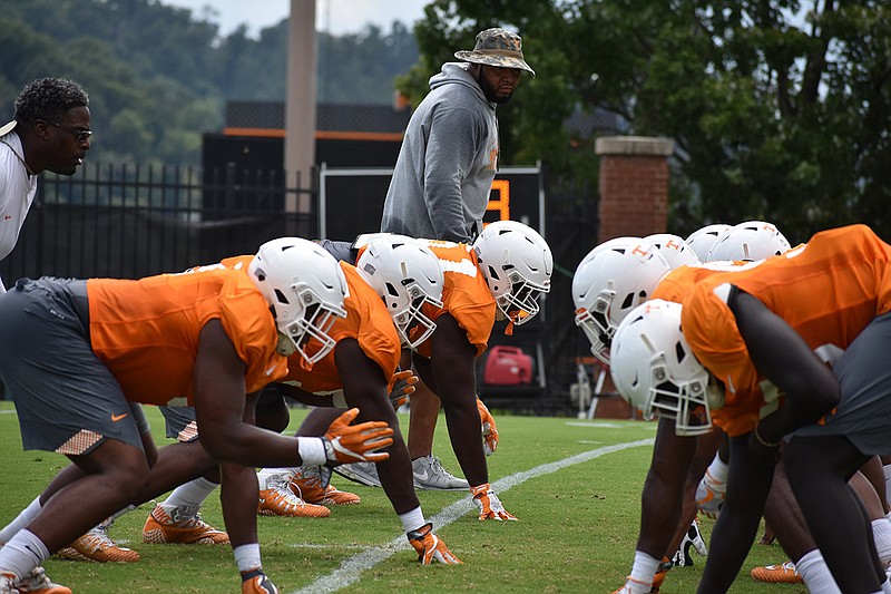 Tennessee defensive linemen work through a drill during practice Tuesday at Haslam Field in Knoxville.