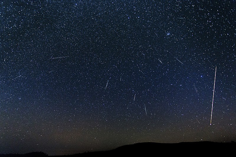 This long exposure photo shows 2015 Perseid meteor activity over Phu Lom Lo, Pitsanulok, Thailand. (Photo: Getty Images/iStockphoto/JChaikom)