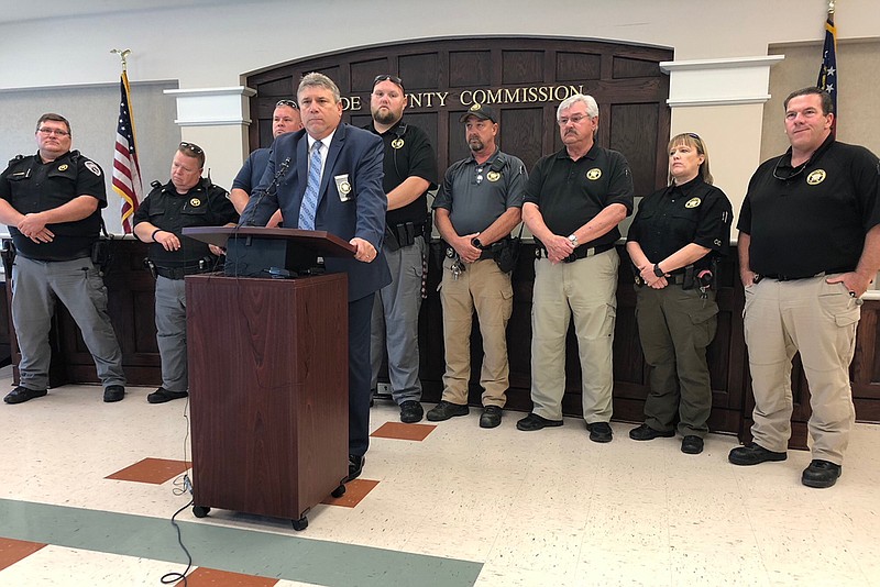 Dade County Sheriff Ray Cross stands before reporters during a news conference at the Dade County Commission building on Aug. 8, 2018, the day after sheriff's Major Tommy Bradford was hit by a suspect in a high speed chase, resulting in the loss of part of his leg.