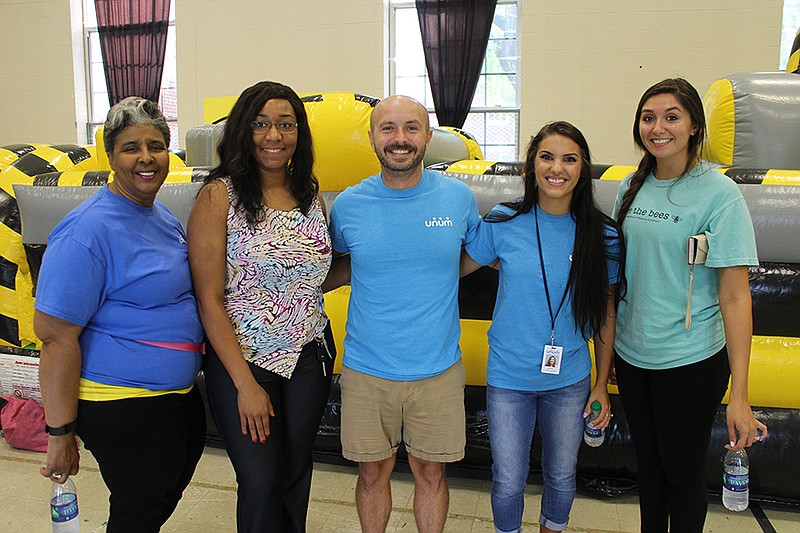 Photo from Chambliss Center for Children /
Unum volunteers Elaine Malone, Taniqua Grier, Miles Huff, Kelsey Swann and Erika Cleaver, from left.
