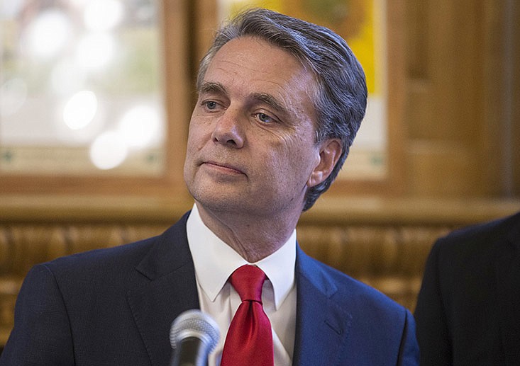 Kansas Governor Jeff Colyer talks to reporters in Topeka, Kan., on Wednesday, Aug. 8, 2018, a day after his primary race against Kansas Secretary of State Kris Kobach. (Travis Heying/The Wichita Eagle via AP)

