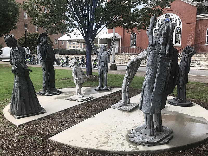 Charlie Brouwer created "A Future and a Hope" from black locust wood. It's among a handful of sculptures in front of the Bessie Smith Cultural Center that can be accessed through the Otocast app.