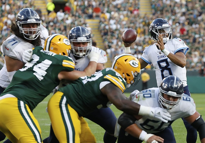 Tennessee Titans quarterback Marcus Mariota throws during the first half of the team's preseason opener against the Green Bay Packers on Thursday night.