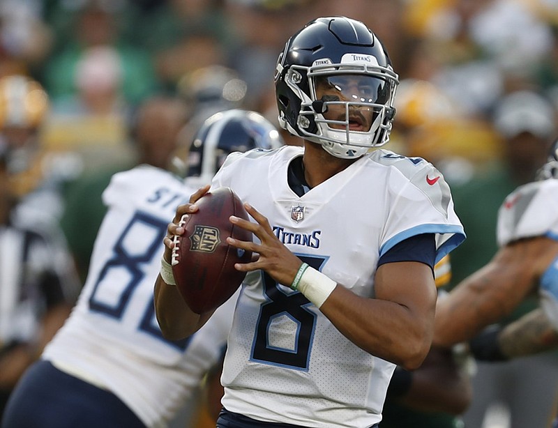 Tennessee Titans quarterback Marcus Mariota drops back to pass during the team's preseason opener Thursday night at Green Bay.