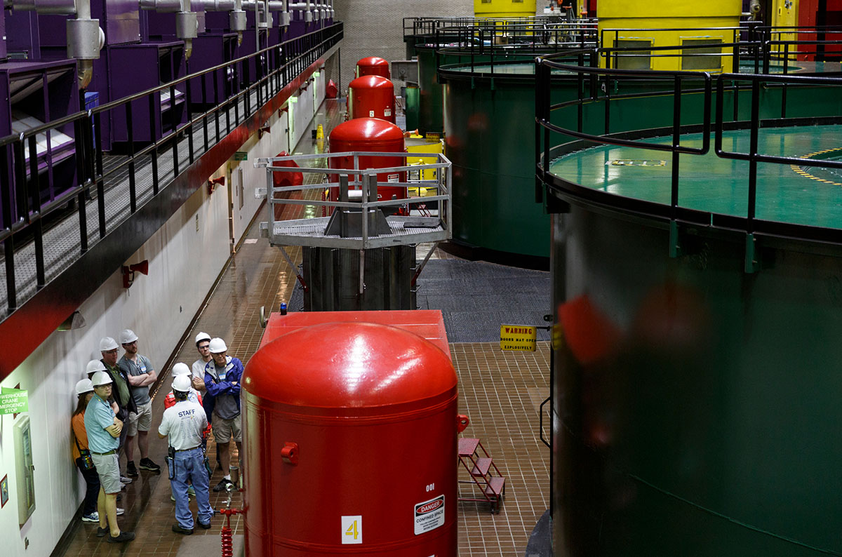 A group is given a tour of the powerhouse floor in TVA's Raccoon Mountain Pumped-Storage Plant on Friday, Aug. 10, 2018, in Chattanooga, Tenn. The hydroelectric facility halted tours for the public after the September 11 terrorist attacks in 2001, but they began offering tours again this year.