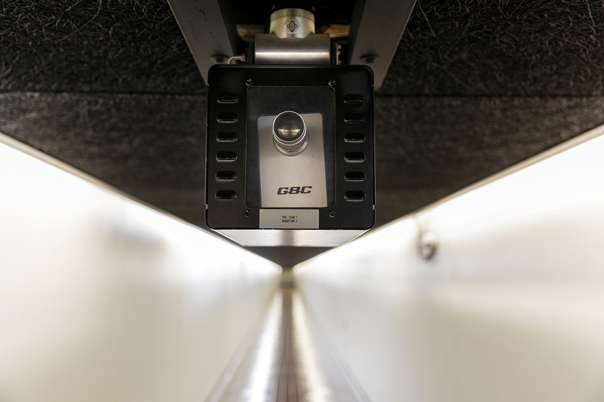 An old security camera hangs from a ceiling inside TVA's Raccoon Mountain Pumped-Storage Plant on Friday, Aug. 10, 2018, in Chattanooga, Tenn. The hydroelectric facility halted tours for the public after the September 11 terrorist attacks in 2001, but they began offering tours again this year.