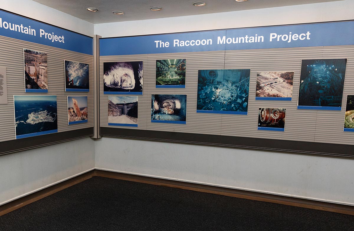 Old photos shown to groups on the original tour still hang inside TVA's Raccoon Mountain Pumped-Storage Plant on Friday, Aug. 10, 2018, in Chattanooga, Tenn. The hydroelectric facility halted tours for the public after the September 11 terrorist attacks in 2001, but they began offering tours again this year.