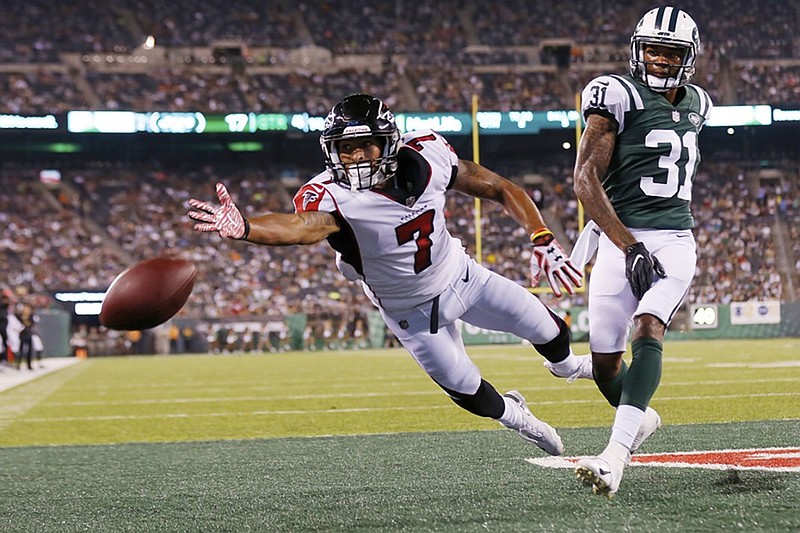 The ball gets away from the Atlanta Falcons' Devin Gray as New York Jets cornerback Derrick Jones looks on during their teams' preseason opener Friday night in East Rutherford, N.J.