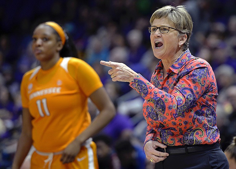 This Jan. 28, 2018, file photo shows Tennessee head coach Holly Warlick, right, shouting instructions to her players as center Kasiyahna Kushkituah (11) watches in the fourth quarter of an NCAA college basketball game in Baton Rouge, La.