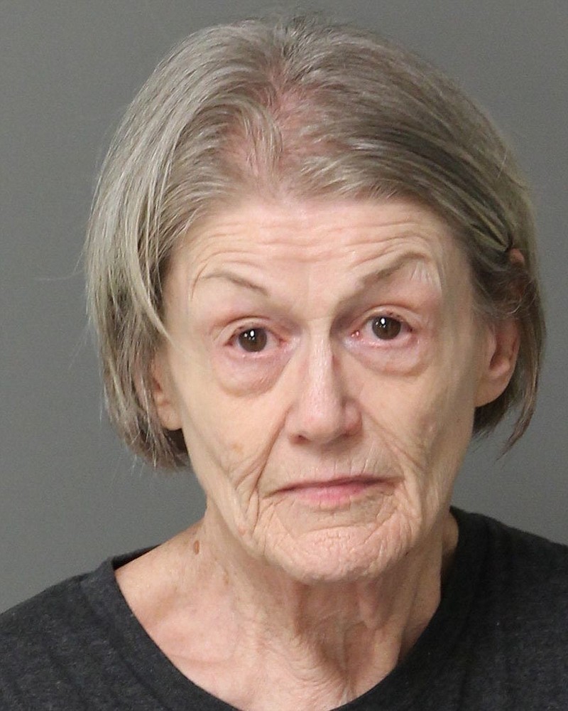 This undated photo provided by the Wake City-County Bureau of Identification on Tuesday, Aug. 14, 2018, shows Roxanne Reed, 65, of Garner, N.C. She was accused of plotting to kill her 88-year-old mother after police investigated an online romance scam she was involved in. (AP Photo/Wake City-County Bureau of Identification)

