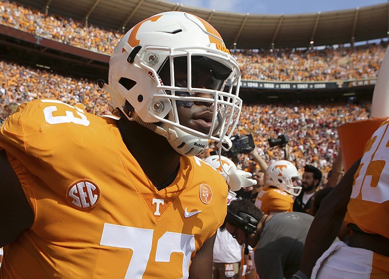 Tennessee offensive lineman Trey Smith takes the field for the Vols' home game against South Carolina last October. Smith missed extensive time in the offseason while receiving treatment for blood clots in his lungs, but he is expected to return to full-contact work within the next week.