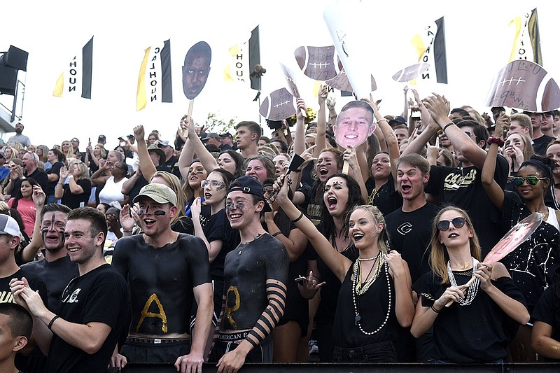 The Calhoun student section cheers as the Yellow Jackets take the field. The Dalton Catamounts visited the Calhoun Yellow Jackets in GHSA high school football action on August 25, 2017. 