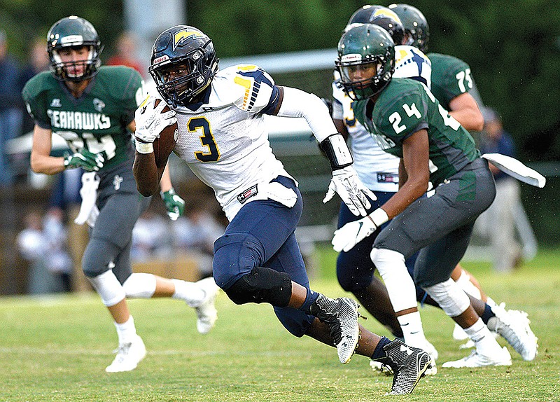 Chattanooga Christian's Mondo Ellison (3) breaks into the open on his way to the Charger's first touchdown. The Chattanooga Christian School Chargers visited the Silverdale Baptist Academy Seahawks in TSSAA football action of Sept. 1, 2017. 