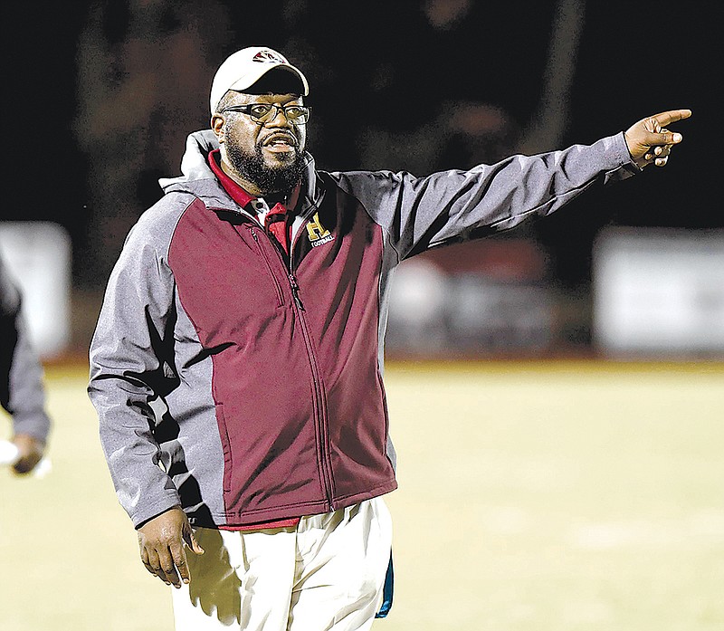 Howard head coach John Starr instructs his team.  The Howard Hustlin Tigers visited the Signal Mountain Eagles in TSSAA football action on October 28, 2016 .