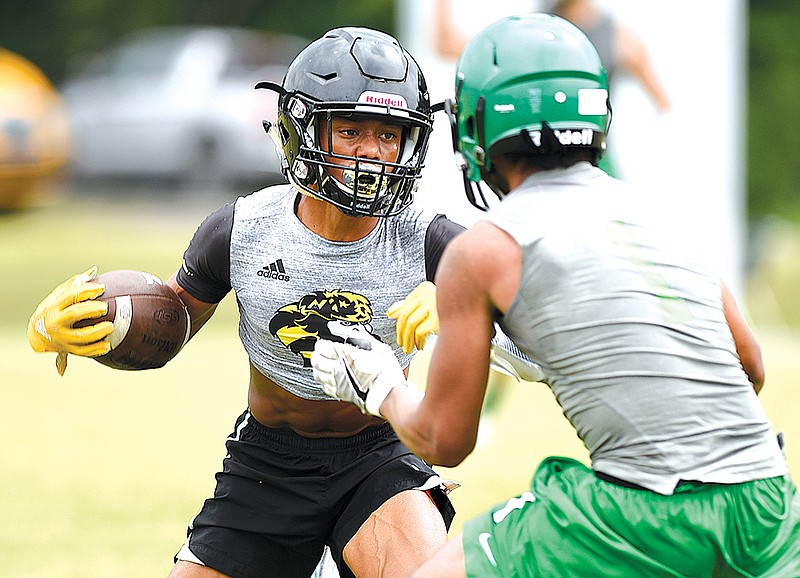 North Murray running back Dante Tidwell runs the ball during a 7-on-7 scrimmage Thursday, June 21, 2018 at Southeast Whitfield High School in Dalton, Georgia.