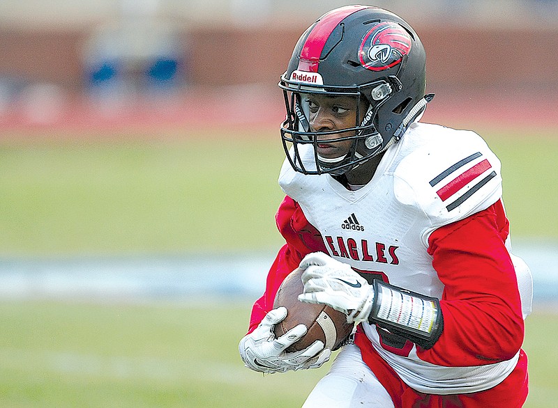 Signal Mountain's Travion Williams (5) turns up field after making a catch against Red Bank at Red Bank Community Stadium on Friday, Sept. 1, in Chattanooga, Tenn.