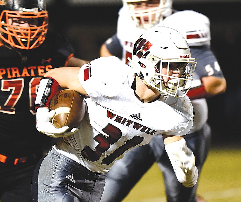 Hudson Petty (31) runs the ball for the Tigers. The Whitwell Tigers visited the South Pittsburg Pirates in the quarterfinals of the TSSAA football playoffs on November 17, 2017.